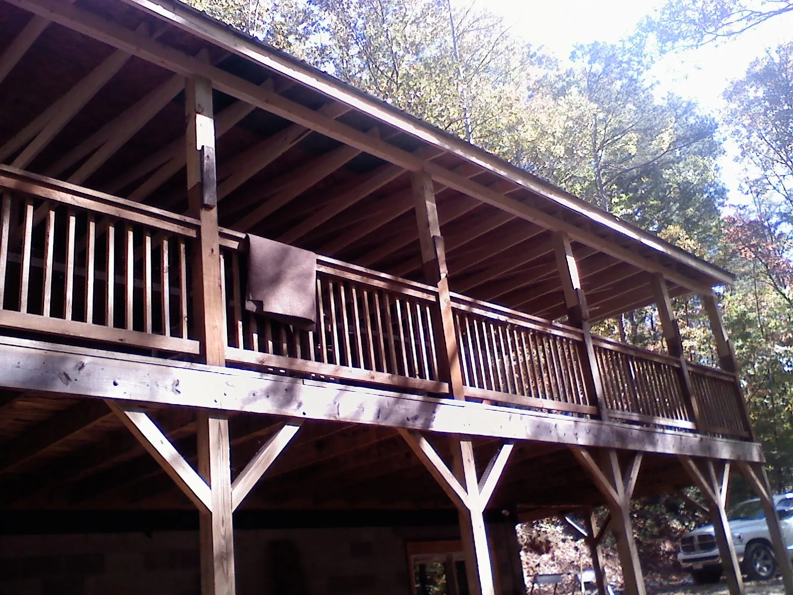 Timber framing under a new elevated porch and deck — Roof Leak Repair in West Haven by Roofing Brothers
